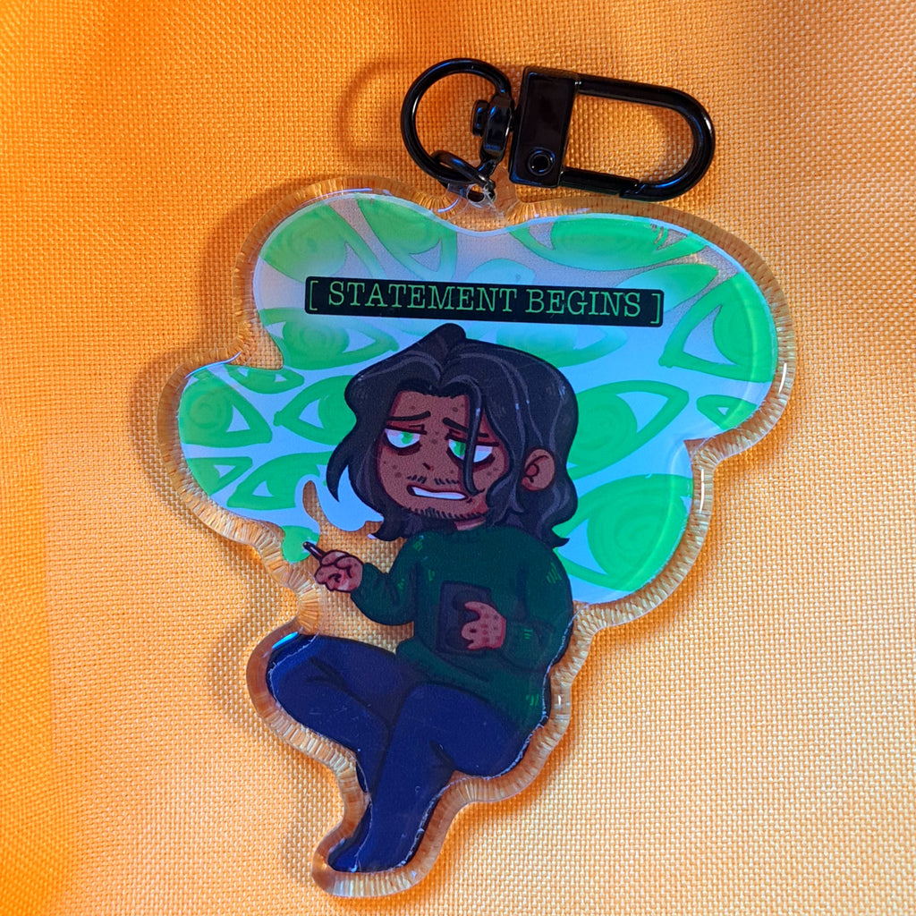 Statement Begins keychain
